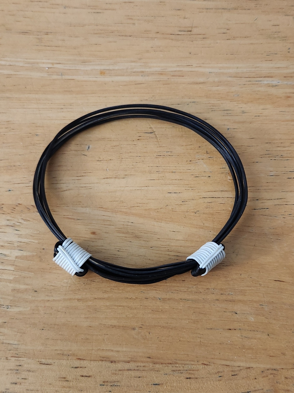 Black Wire Wrapped Bangle Bracelet with White Accents